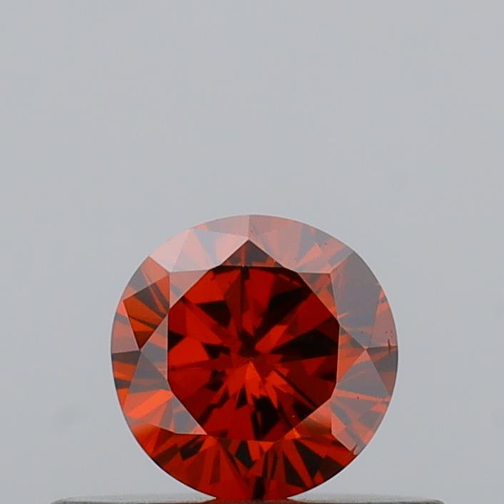 Actual 0.3 carat Fancy Vivid Orange Round lab-grown diamond
