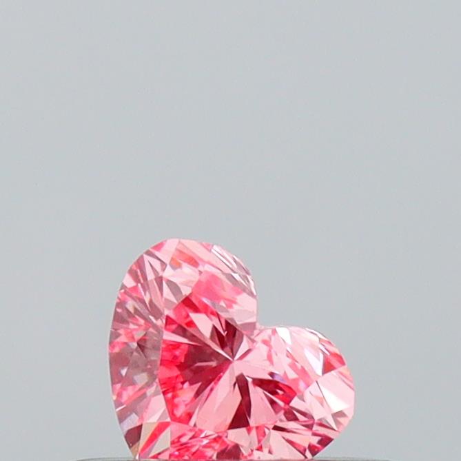 Actual 0.25 carat Fancy Vivid Pink Heart lab-grown diamond