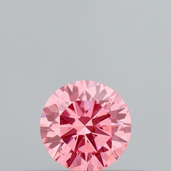 Actual 0.26 carat Fancy Vivid Pink Round lab-grown diamond